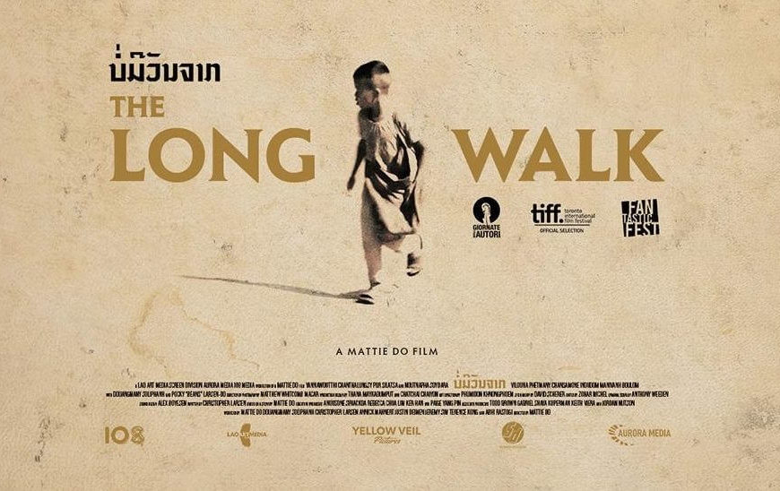 The Long Walk movie poster showing a young boy running across a dirt road